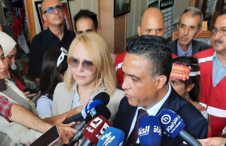 Handing over 15,000 aprons to orphaned and destitute children - Al-Hiwar Al-Jazairia