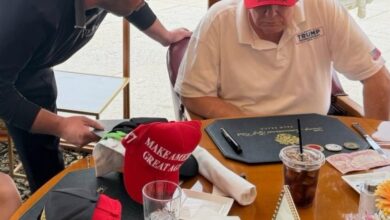 A picture of Saddam's coin in front of Trump ignites controversy - Algerian Al-Hiwar newspaper