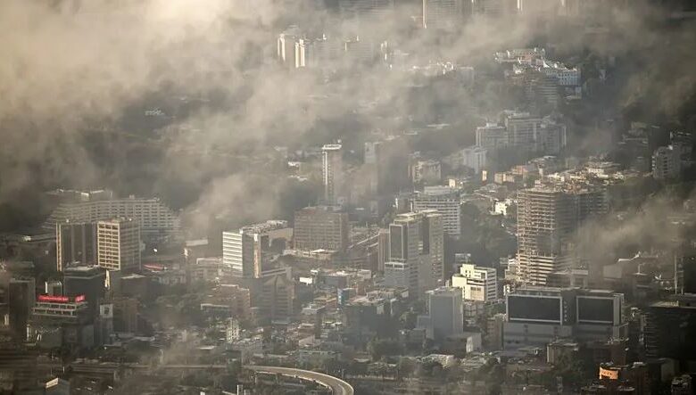 A series of explosions rock Caracas, causing chaos and smoke rising in several locations